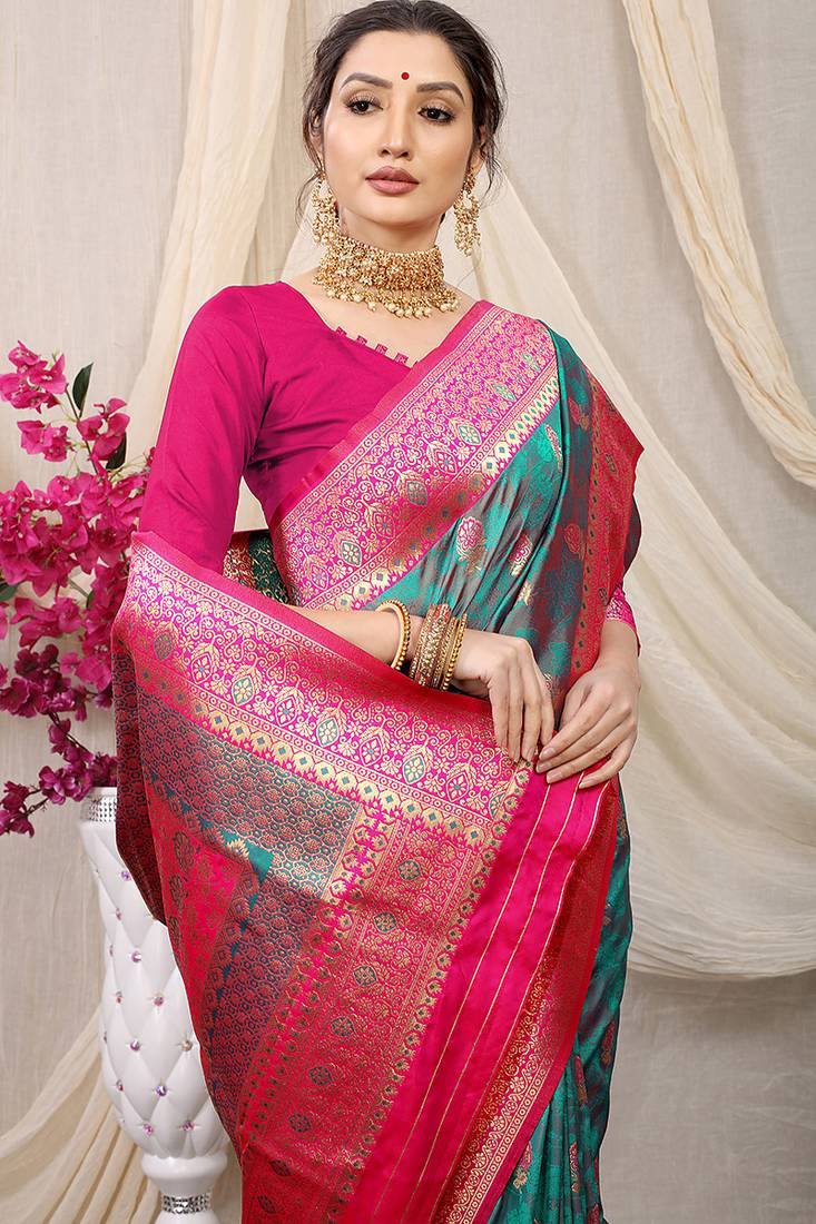 Teal green banarasi silk blend saree with rich zari woven border