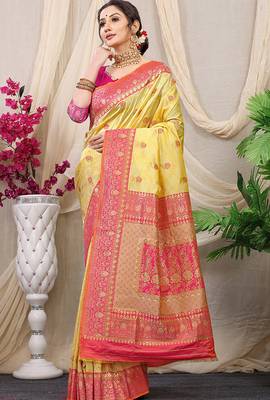 Yellow banarasi silk blend saree with rich zari woven border 1