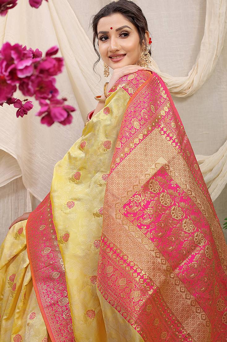 Yellow banarasi silk blend saree with rich zari woven border
