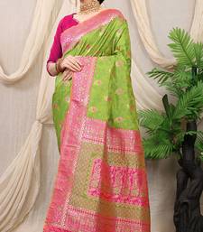 Light green banarasi silk blend saree with rich zari woven border