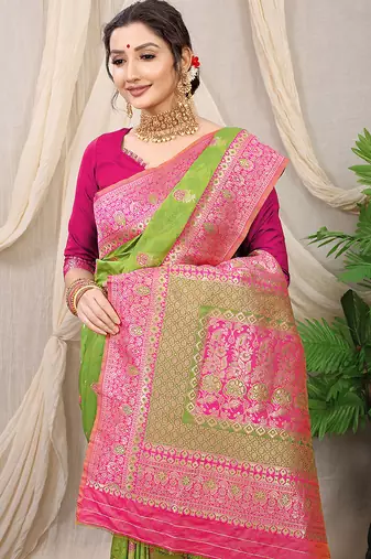 Light green banarasi silk blend saree with rich zari woven border