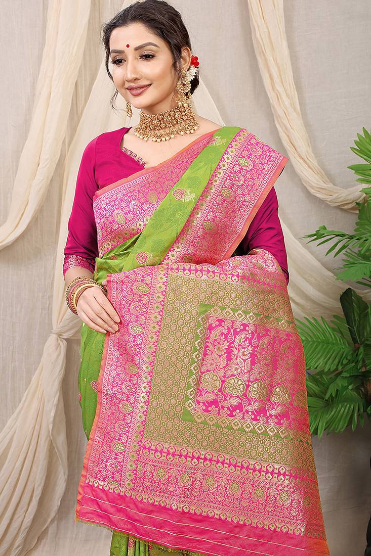 Light green banarasi silk blend saree with rich zari woven border