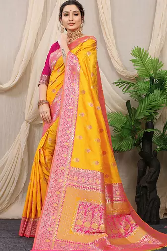Mustard yellow banarasi silk blend saree with rich zari woven border