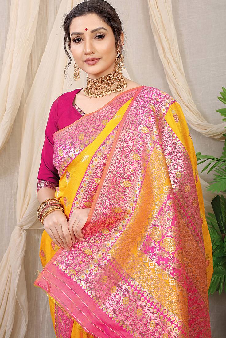 Mustard yellow banarasi silk blend saree with rich zari woven border
