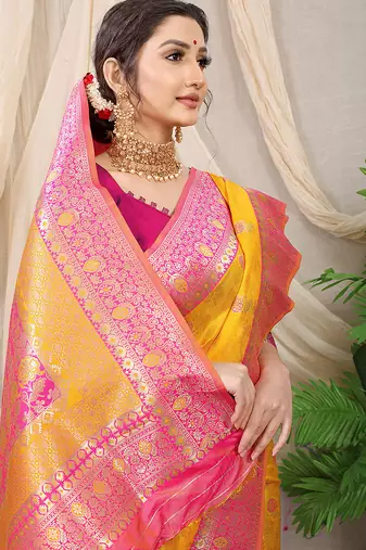 Mustard yellow banarasi silk blend saree with rich zari woven border