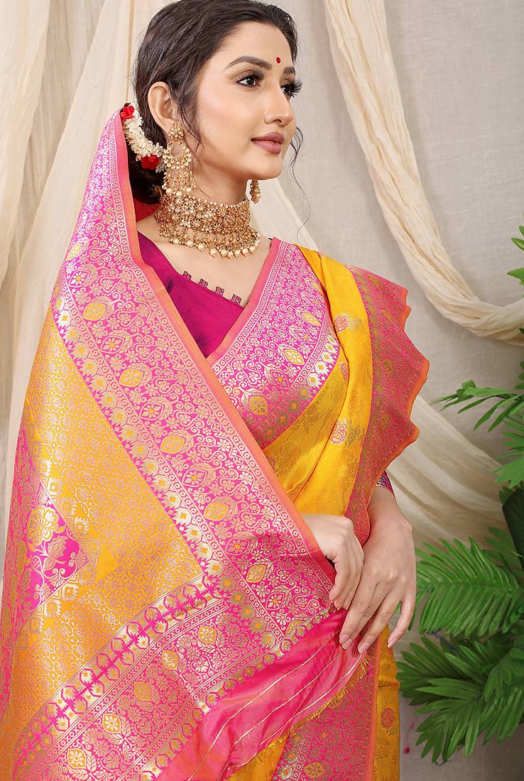 Mustard yellow banarasi silk blend saree with rich zari woven border