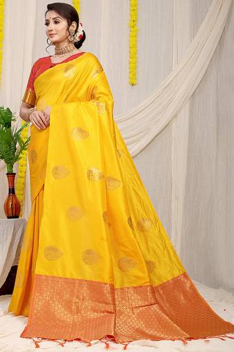 Yellow banarasi silk blend saree with zari buttas & green zari border