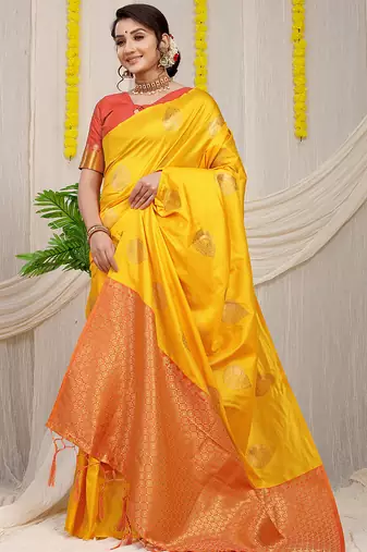 Yellow banarasi silk blend saree with zari buttas & green zari border