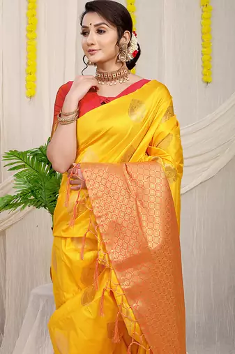 Yellow banarasi silk blend saree with zari buttas & green zari border