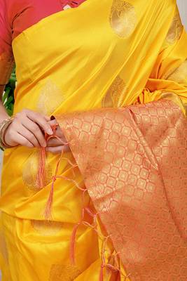 Yellow banarasi silk blend saree with zari buttas & green zari border 4