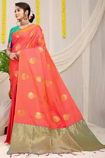 Peach banarasi silk blend saree with zari buttas & green zari border