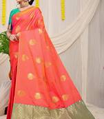 Peach banarasi silk blend saree with zari buttas & green zari border