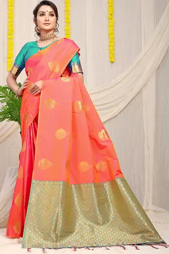 Peach banarasi silk blend saree with zari buttas & green zari border