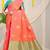 Peach banarasi silk blend saree with zari buttas & green zari border