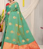 Sea green banarasi silk blend saree with zari buttas & green zari border