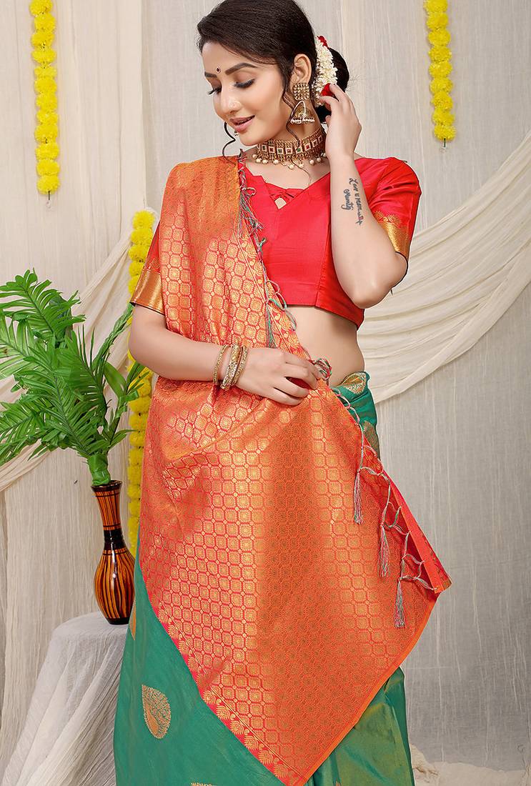 Sea green banarasi silk blend saree with zari buttas & green zari border