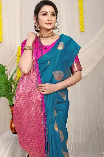Teal blue banarasi silk blend saree with zari buttas & green zari border