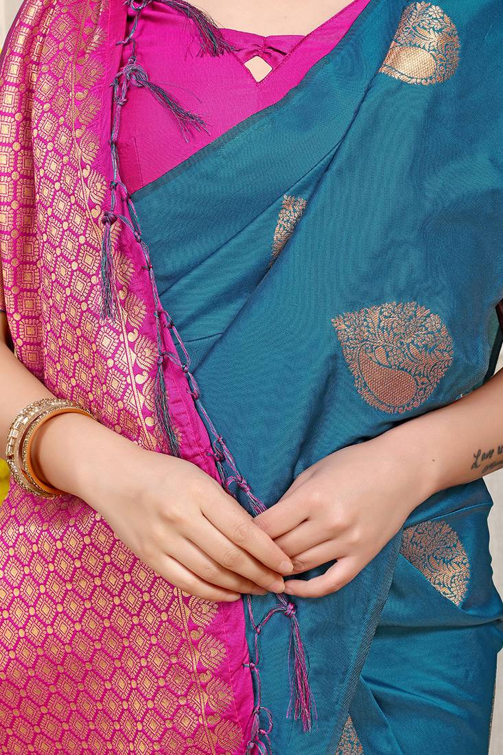 Teal blue banarasi silk blend saree with zari buttas & green zari border