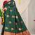 Bottle green banarasi silk blend saree with zari buttas & green zari border