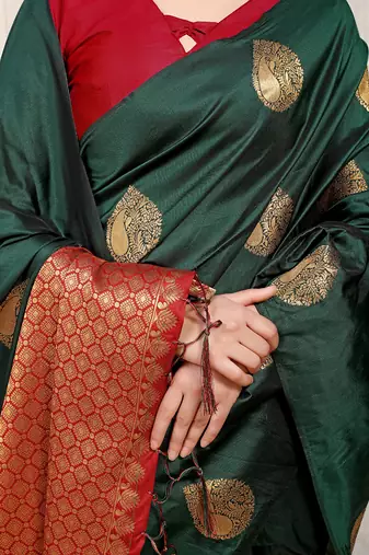 Bottle green banarasi silk blend saree with zari buttas & green zari border