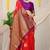 Red banarasi silk blend saree with zari buttas & green zari border