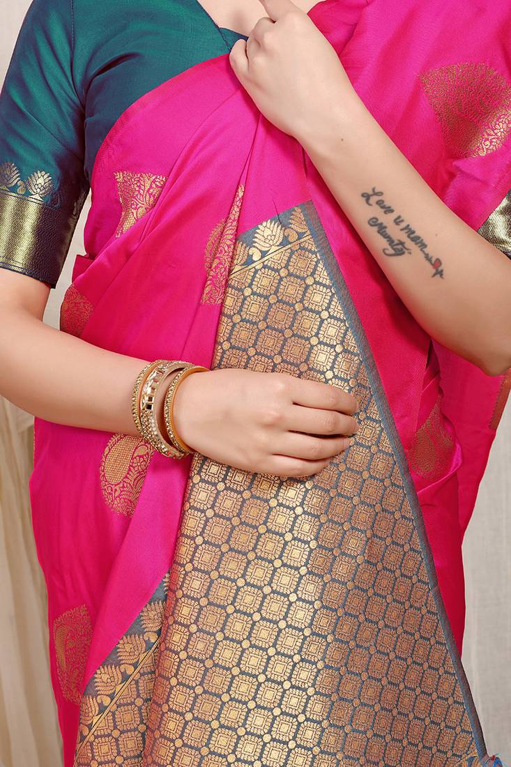 Rani pink banarasi silk blend saree with zari buttas & green zari border
