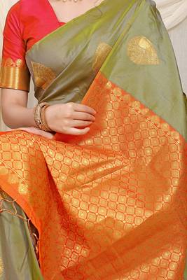 Light olive green banarasi silk blend saree with zari buttas & green zari border 4