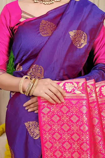 Purple banarasi silk blend saree with  zari butta & rani pink woven border