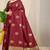 Maroon banarasi silk blend saree with  zari butta & olive green woven border