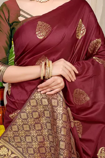 Maroon banarasi silk blend saree with  zari butta & olive green woven border