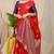 Red banarasi silk blend saree with  zari butta & purple woven border