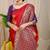 Red banarasi silk blend saree with  zari butta & purple woven border