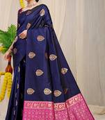 Navy blue banarasi silk blend saree with  zari butta & magenta pink woven border