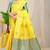 Yellow banarasi silk blend saree with  zari butta & turquoise woven border