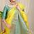 Yellow banarasi silk blend saree with  zari butta & turquoise woven border