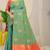 Sea green banarasi silk blend saree with  zari butta & orange woven border
