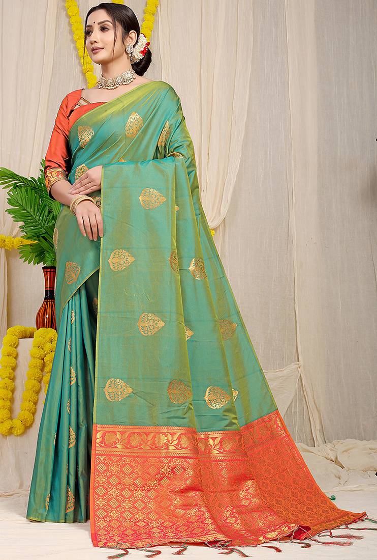 Sea green banarasi silk blend saree with  zari butta & orange woven border