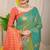 Sea green banarasi silk blend saree with  zari butta & orange woven border