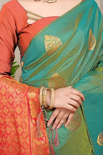 Sea green banarasi silk blend saree with  zari butta & orange woven border