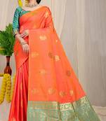 Orange banarasi silk blend saree with  zari butta & sea green woven border
