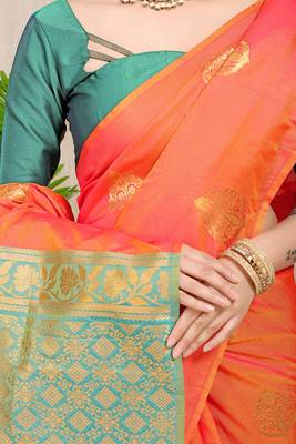 Orange banarasi silk blend saree with  zari butta & sea green woven border 4