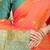 Orange banarasi silk blend saree with  zari butta & sea green woven border