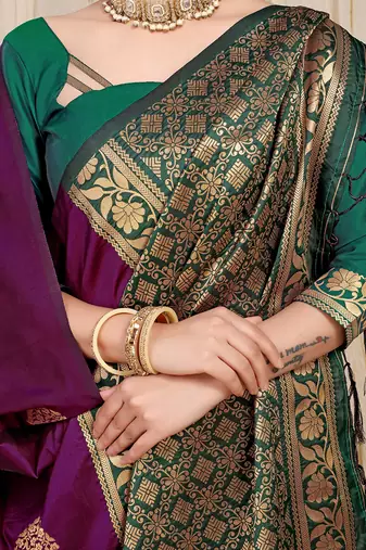Dark purple banarasi silk blend saree with  zari butta & bottle green woven border