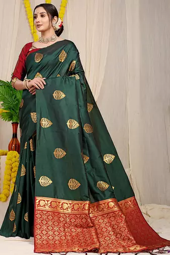 Bottle green banarasi silk blend saree with  zari butta & maroon woven border