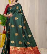 Bottle green banarasi silk blend saree with  zari butta & maroon woven border
