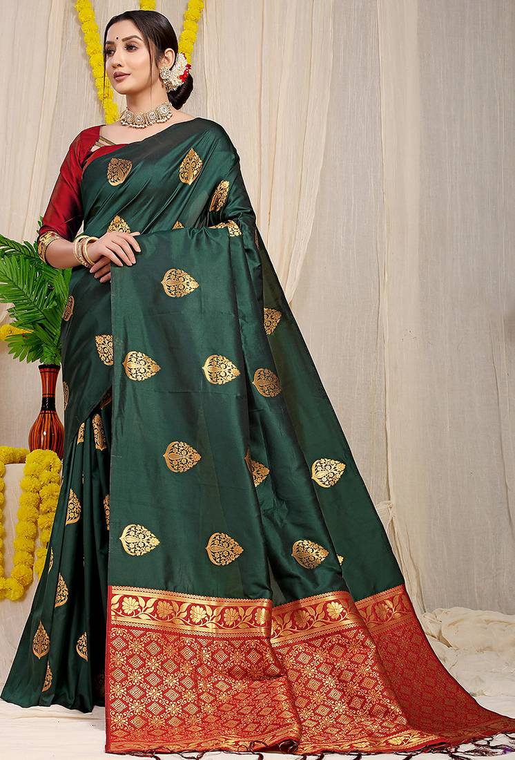 Bottle green banarasi silk blend saree with  zari butta & maroon woven border