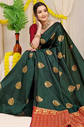 Bottle green banarasi silk blend saree with  zari butta & maroon woven border