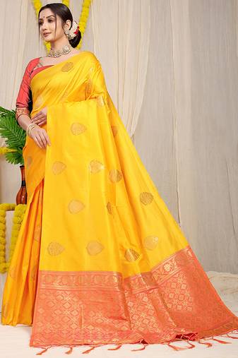 Mustard yellow banarasi silk blend saree with  zari butta & coral orange woven border
