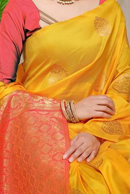 Mustard yellow banarasi silk blend saree with  zari butta & coral orange woven border 4