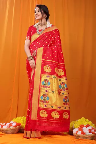 Red paithani silk blend saree with gold zari border & peacock pallu